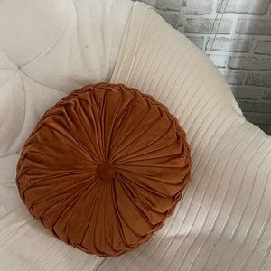 Burnt orange circle pillow